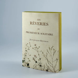 Notebook con copertina Les réveries e laterali giallo senape.